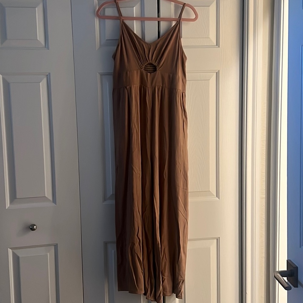 Tan/neutral colored jumpsuit.  Perfect for the Summer and vacation outfits.